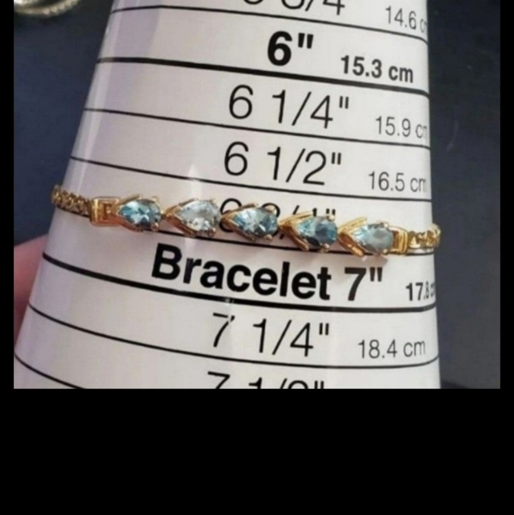 14k yellow gold blue topaz bracelet! This will fit up to about 6 3/4 inch wrist. - Picture 3 of 6